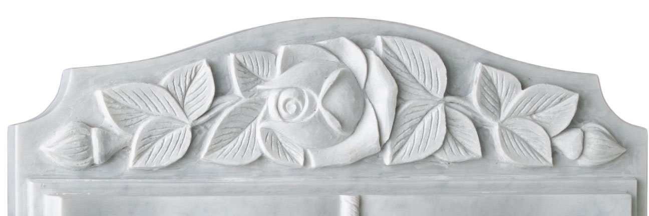 A fully worked book with carved roses