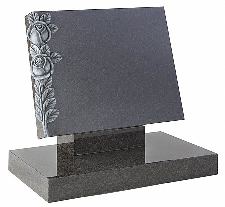 A raised tablet with hand carved and highlighted roses- Churchill Memorials
